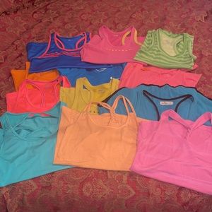 12 athletic shirts size S and XS